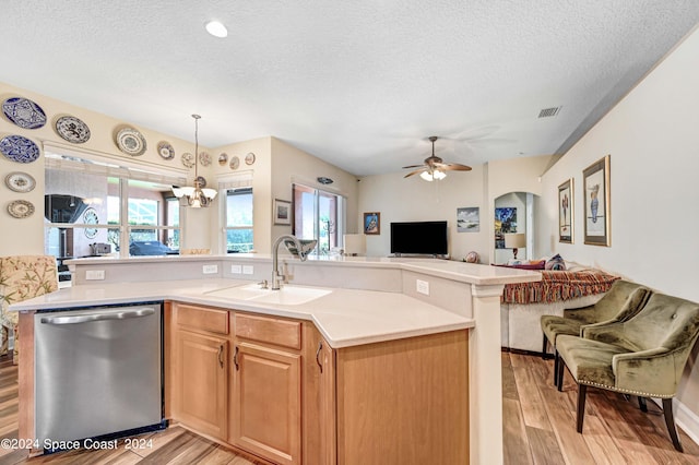 kitchen featuring dishwasher, sink, light wood-type flooring, a textured ceiling, and ceiling fan with notable chandelier