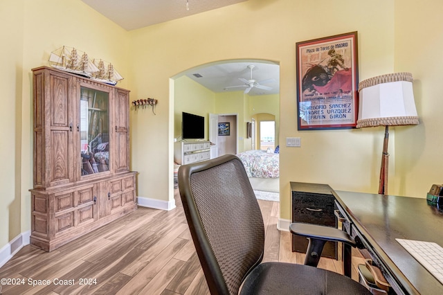 office space with hardwood / wood-style floors and ceiling fan