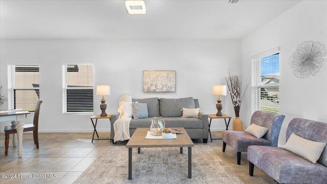 living room featuring light tile patterned floors