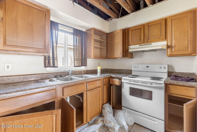 kitchen featuring light tile patterned floors, sink, and white range with electric stovetop