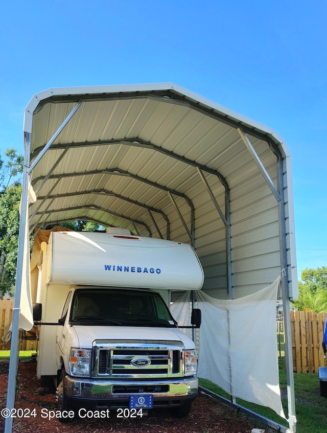 view of parking featuring a carport