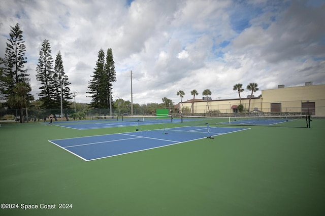 view of sport court featuring community basketball court and fence