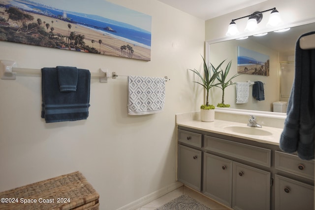 bathroom featuring tile patterned floors and vanity