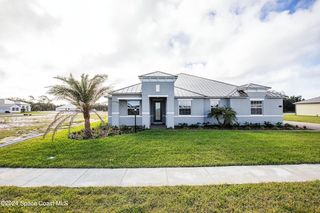 view of front of property with a front yard