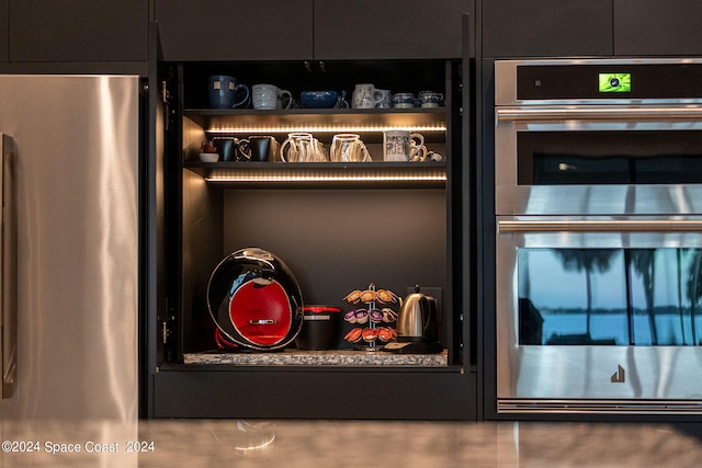 interior details featuring appliances with stainless steel finishes