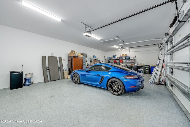 garage featuring a garage door opener