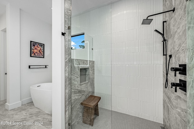 bathroom featuring tile patterned floors and walk in shower