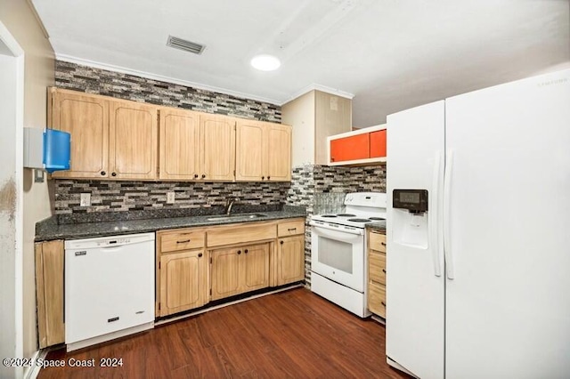 kitchen with white appliances, sink, light brown cabinets, and dark hardwood / wood-style floors