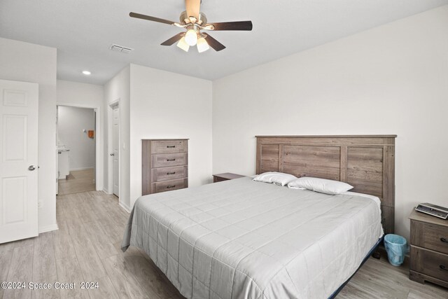 bedroom featuring ceiling fan and light wood-type flooring