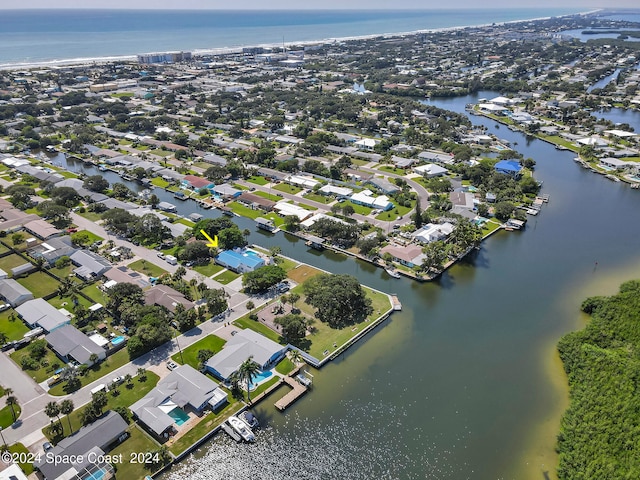 bird's eye view with a water view