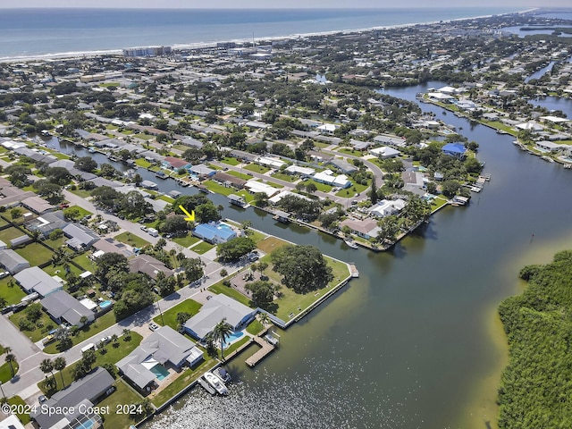 bird's eye view with a water view and a residential view