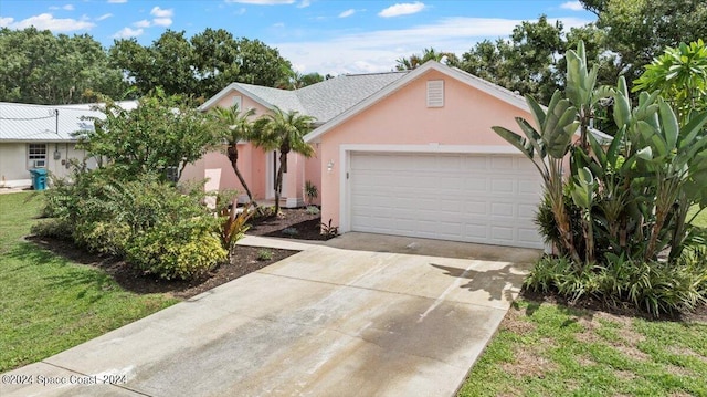 view of front of house with a garage