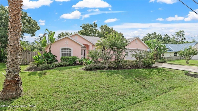 ranch-style house with a front lawn