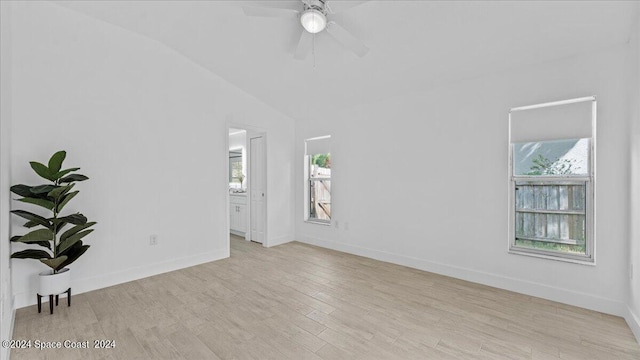 interior space featuring ceiling fan, light wood-type flooring, and vaulted ceiling