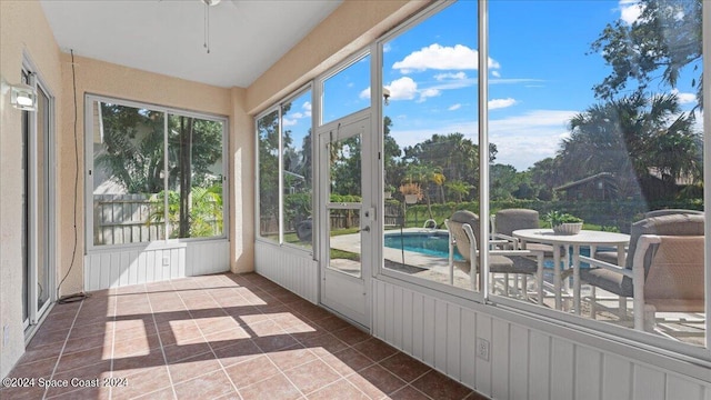 unfurnished sunroom with a wealth of natural light