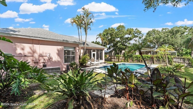 view of swimming pool featuring a patio area