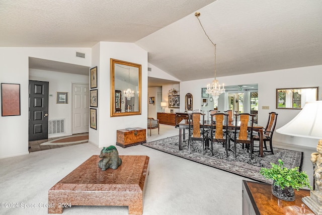 dining space featuring light carpet, visible vents, a chandelier, and lofted ceiling