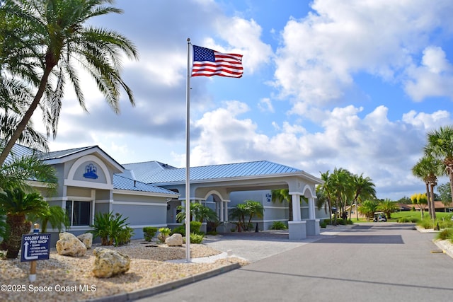 view of property featuring driveway