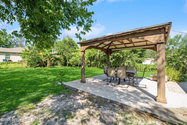 exterior space with a gazebo and a patio area