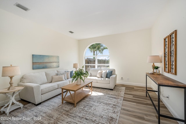 living room with hardwood / wood-style flooring