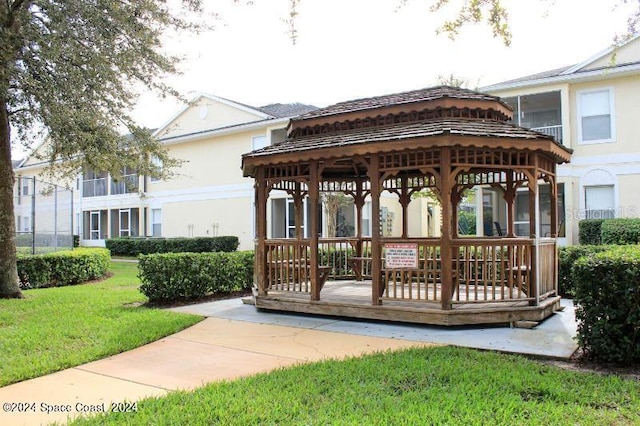 view of community with a gazebo and a yard