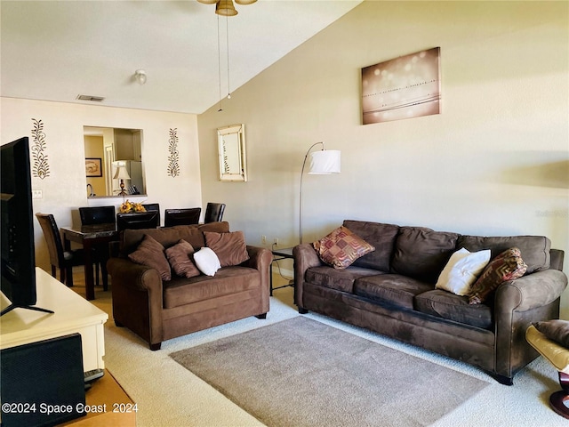 living room with vaulted ceiling