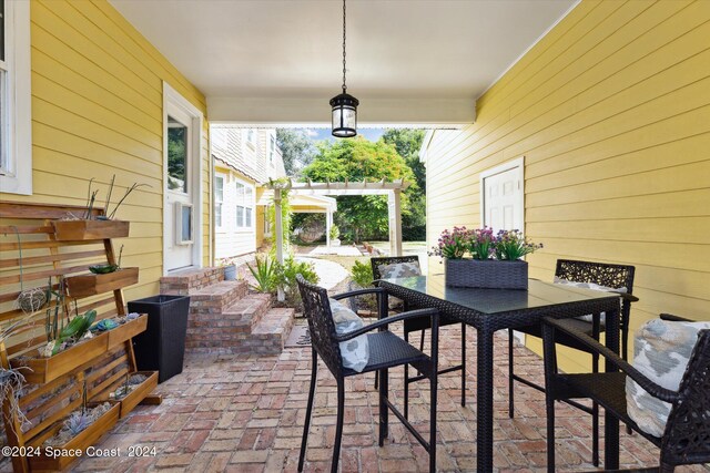 view of patio featuring a pergola