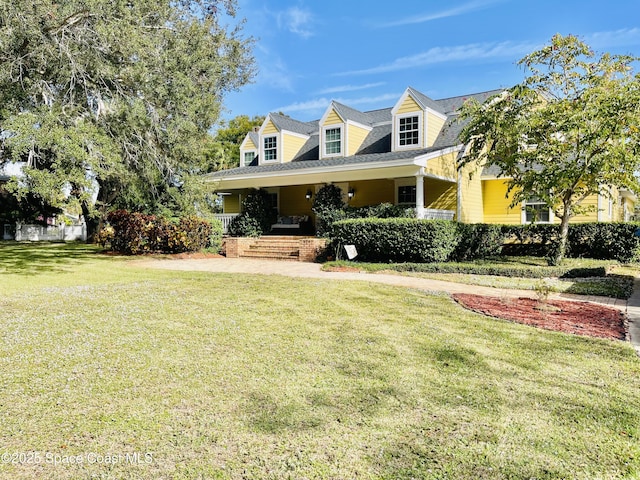 cape cod home with a front lawn and a porch