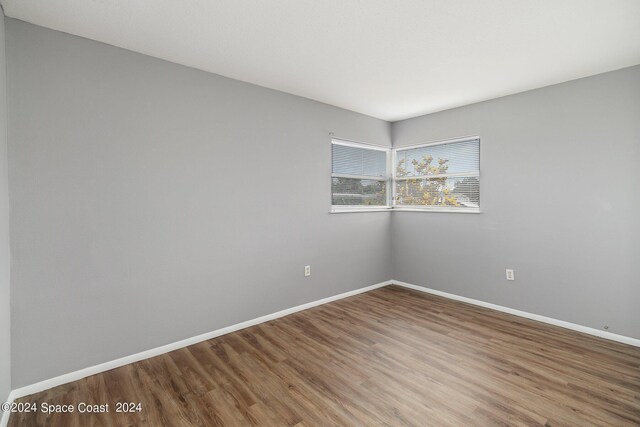 empty room featuring hardwood / wood-style floors