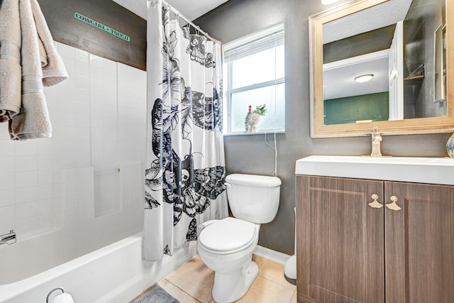 full bathroom featuring shower / bath combo with shower curtain, tile patterned flooring, vanity, and toilet