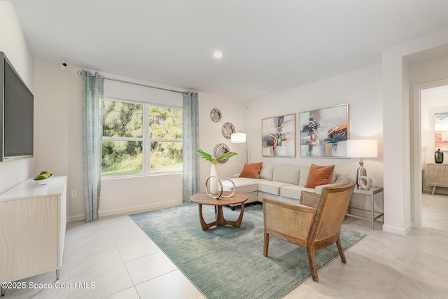 living room with light tile patterned flooring