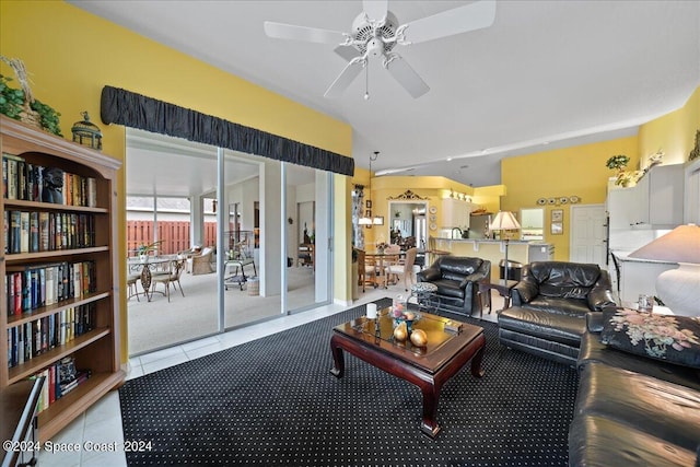 tiled living room featuring ceiling fan