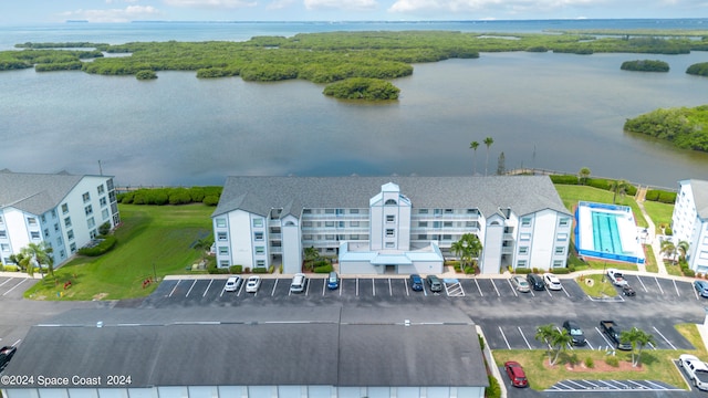 drone / aerial view with a water view