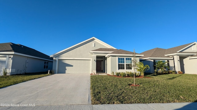 single story home with a front lawn and a garage