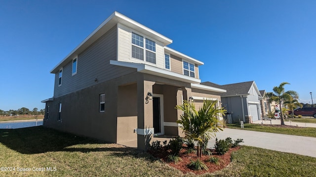 view of front of home featuring a front lawn