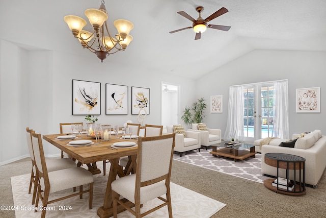 carpeted dining area with lofted ceiling, ceiling fan with notable chandelier, and french doors