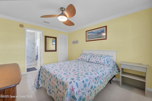 tiled bedroom featuring crown molding, a closet, visible vents, a ceiling fan, and baseboards