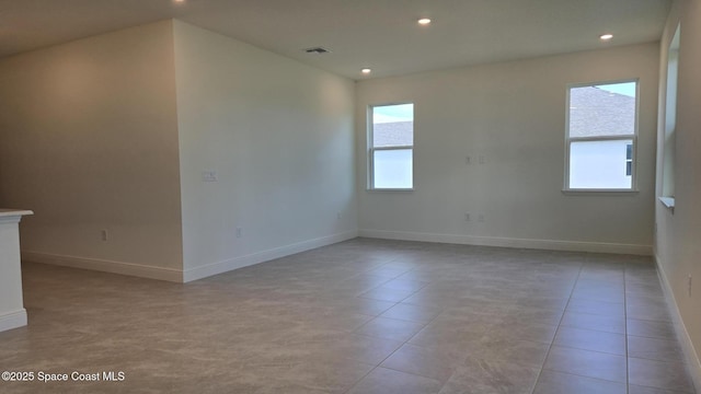 4376 Kelsey Ln, Sebastian, FL 32976 - spare room featuring recessed lighting and light tile patterned floors