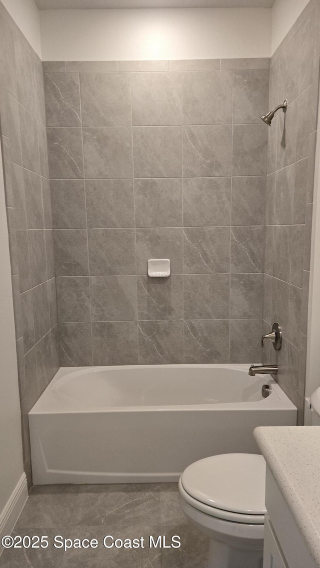 4376 Kelsey Ln, Sebastian, FL 32976 - bathroom featuring vanity, bathing tub / shower combination, and tile patterned floors