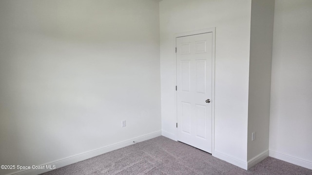 4376 Kelsey Ln, Sebastian, FL 32976 - unfurnished room featuring carpet and baseboards