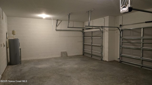 4376 Kelsey Ln, Sebastian, FL 32976 - garage featuring electric water heater, a garage door opener, and concrete block wall