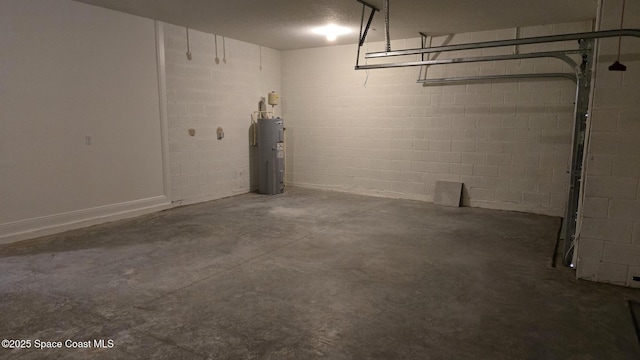 4376 Kelsey Ln, Sebastian, FL 32976 - garage with electric water heater and concrete block wall