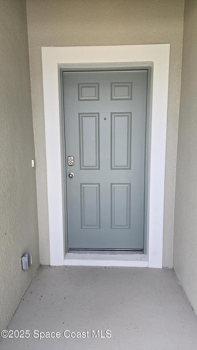 4376 Kelsey Ln, Sebastian, FL 32976 - entrance to property with stucco siding
