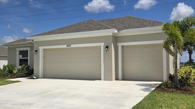 4376 Kelsey Ln, Sebastian, FL 32976 - view of front facade with stucco siding, an attached garage, a shingled roof, and driveway