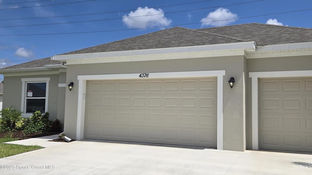 4376 Kelsey Ln, Sebastian, FL 32976 - garage featuring concrete driveway