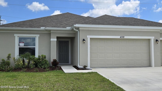 4376 Kelsey Ln, Sebastian, FL 32976 - view of front facade featuring roof with shingles, an attached garage, stucco siding, concrete driveway, and a front lawn