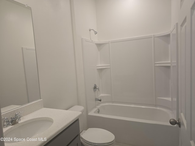 full bathroom featuring shower / tub combination, vanity, and toilet