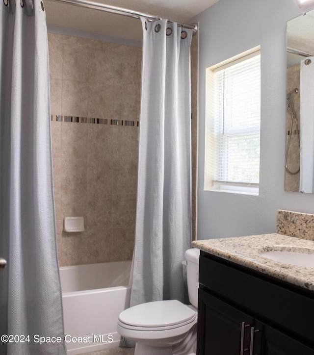 680 Easton Forest Cir SE, Palm Bay, FL 32909 - bathroom featuring vanity, shower / bath combo, and toilet