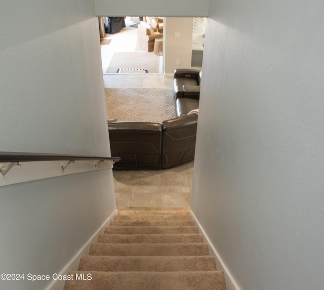680 Easton Forest Cir SE, Palm Bay, FL 32909 - stairway with baseboards and tile patterned floors