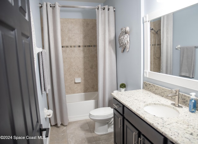 full bathroom with vanity, tile patterned flooring, shower / bath combination with curtain, and toilet